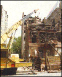 Demolishing an unsafe building.  Property of NYCHPD.