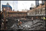 Archaeologists examine part of an 18th century ship discovered in July 2010 at the site of the new World Trade Center. Fred R. Conrad/©The New York Times