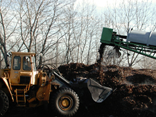 photo: finished compost passes through the trommel one last time