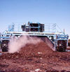 Turning windrows at DSNY Fresh Kills composting facility