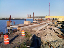 image: The dock is continued along the length of the Gowanus Bay inlet