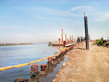 image: Posts and reinforcement steel beams are set into the water