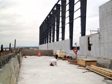 image: The processing building's structural columns go up