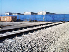 image: Railroad track is installed within the South Brooklyn Marine Terminal up to the Sims fence line
