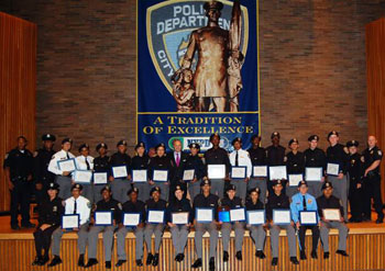 Graduates belonging to Company B of the Law Enforcement Exploring Academy with Police Commissioner Raymond W. Kelly Graduates belonging to Company B of the Law Enforcement Exploring Academy with Police Commissioner Raymond W. Kelly