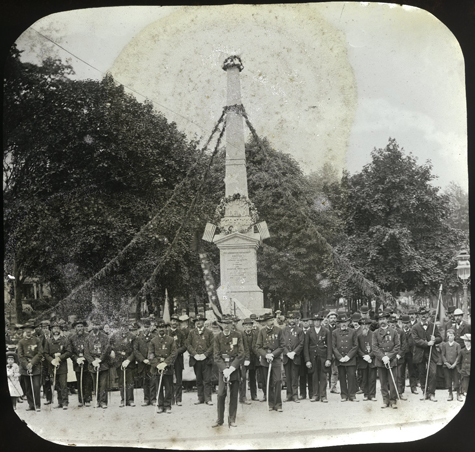 Civil War veterans in front of Flushing war monument, ca. 1890. The Flushing Civil War Monument was erected in 1865, and reads "Erected in memory of the patriotic volunteers from Flushing who sacrificed their lives for the preservation of Our Union, 1861-1865.