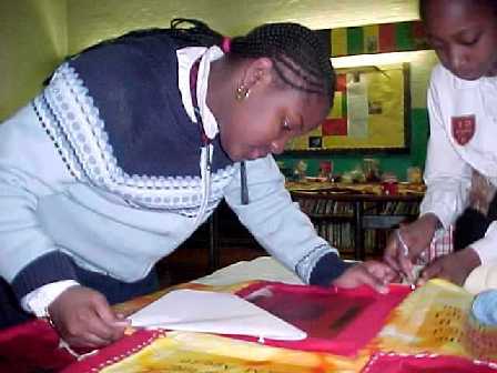 Girl making Quilt