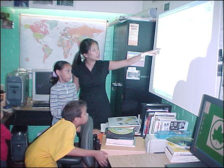 Tabitha Tsai, IEEP Program Manager, instructs student participants at Pelham Fritz Computer Resource Center