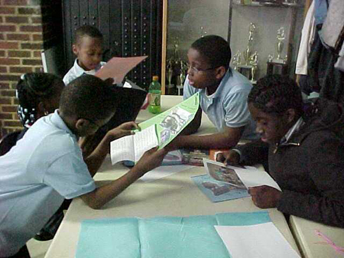 Kids reading letters
