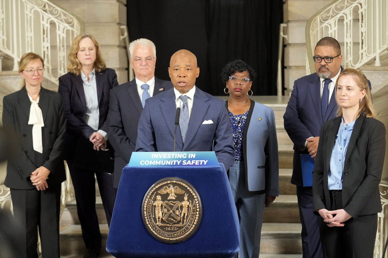 Mayor Adam accompanies by a group of district attorneys were giving a press briefing