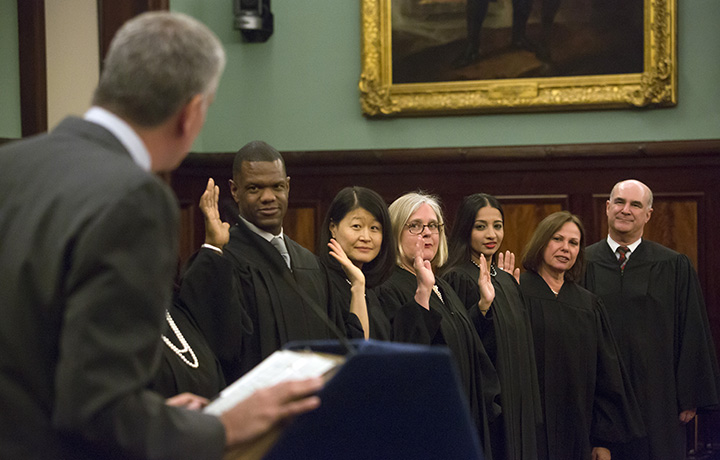 Mayor de Blasio swears in 28 recently appointed judges in a swearing in ceremony
                                           
