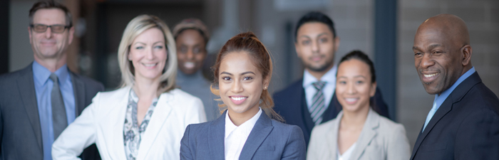 FCLS Header image, group of attorneys standing outside a courthouse