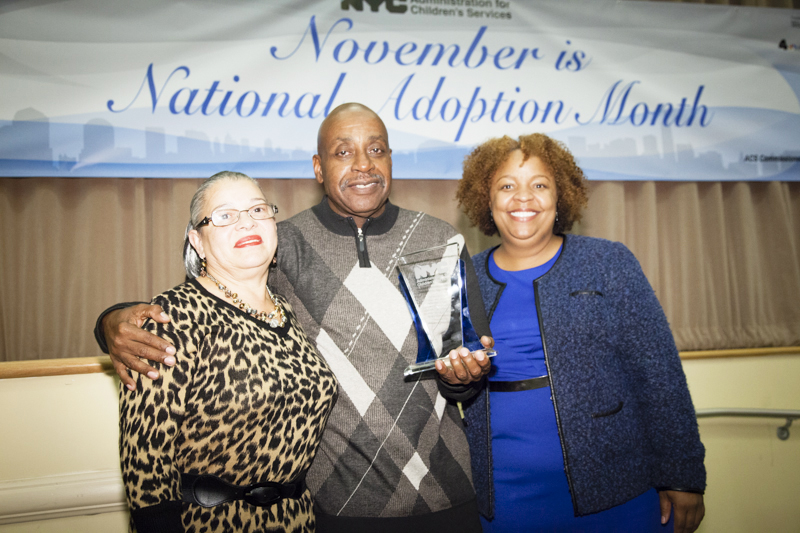 Deputy Commissioner Benita Miller at right, with Franklin and Ana Myrick