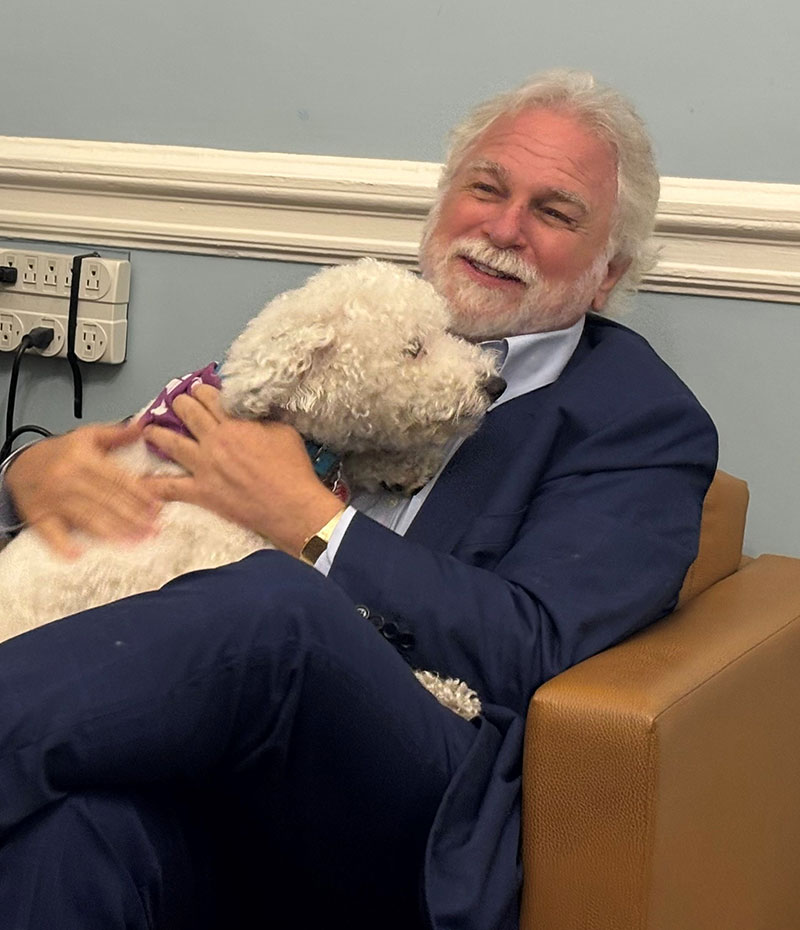 Photo of First Deputy Mayor Randy Mastro with his newly adopted dog Kato