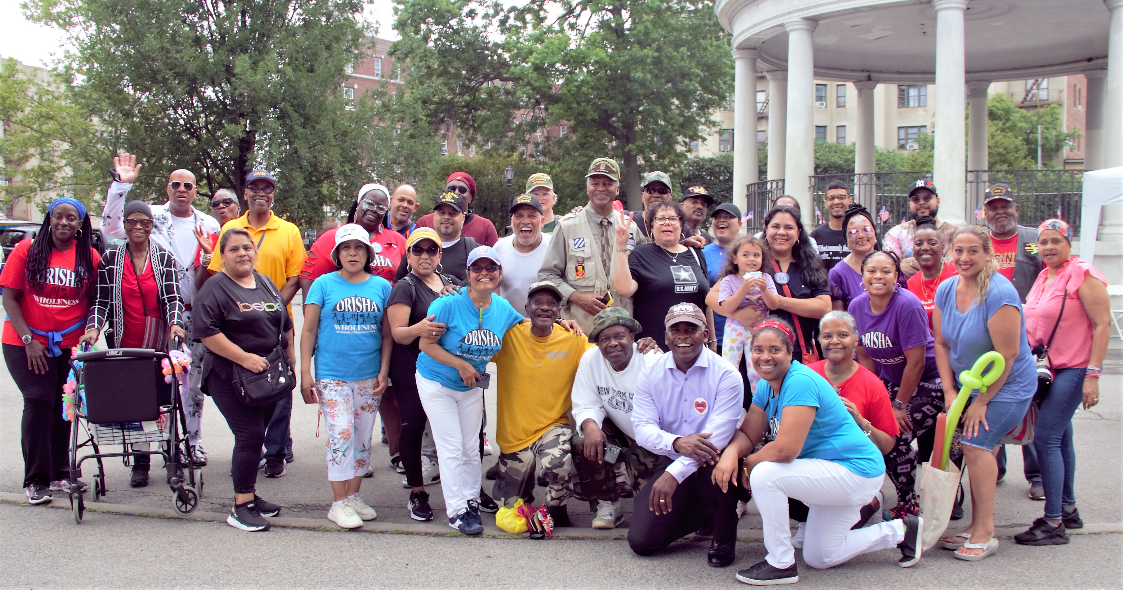 Group of BXCB7 members standing and smiling
                                           