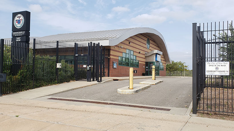 Community Board 18 building entrance viewed from the sidewalk
                                           