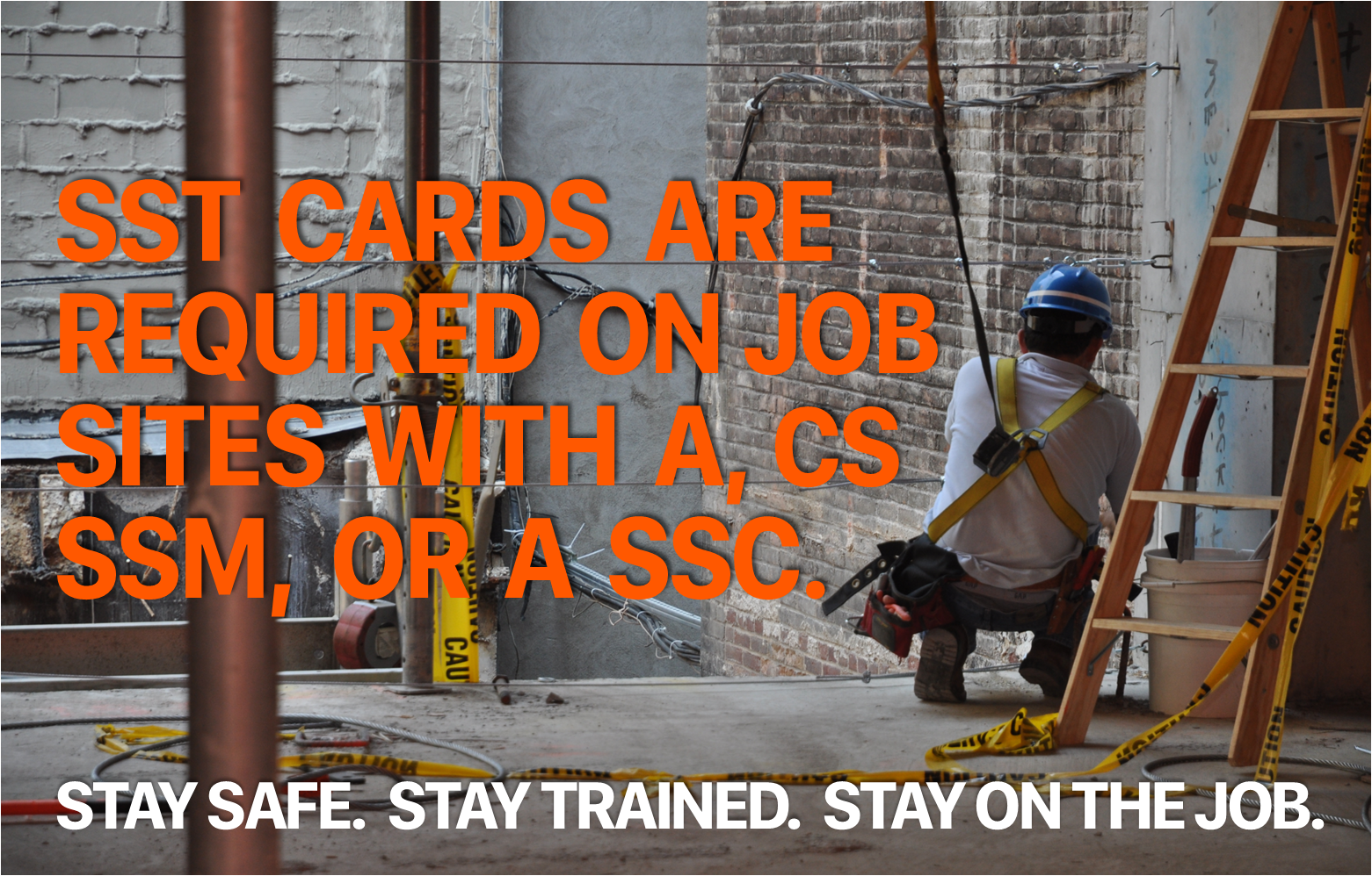 A man in hardhat with text overlaid that reads: "Stay safe. Stay trained. Stay on the job."