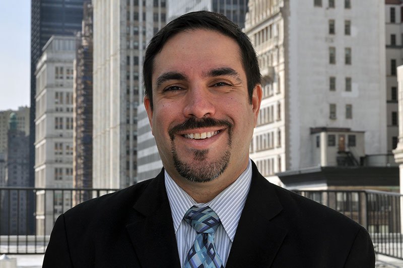 Gus Sirakis, R.A., Deputy Commissioner