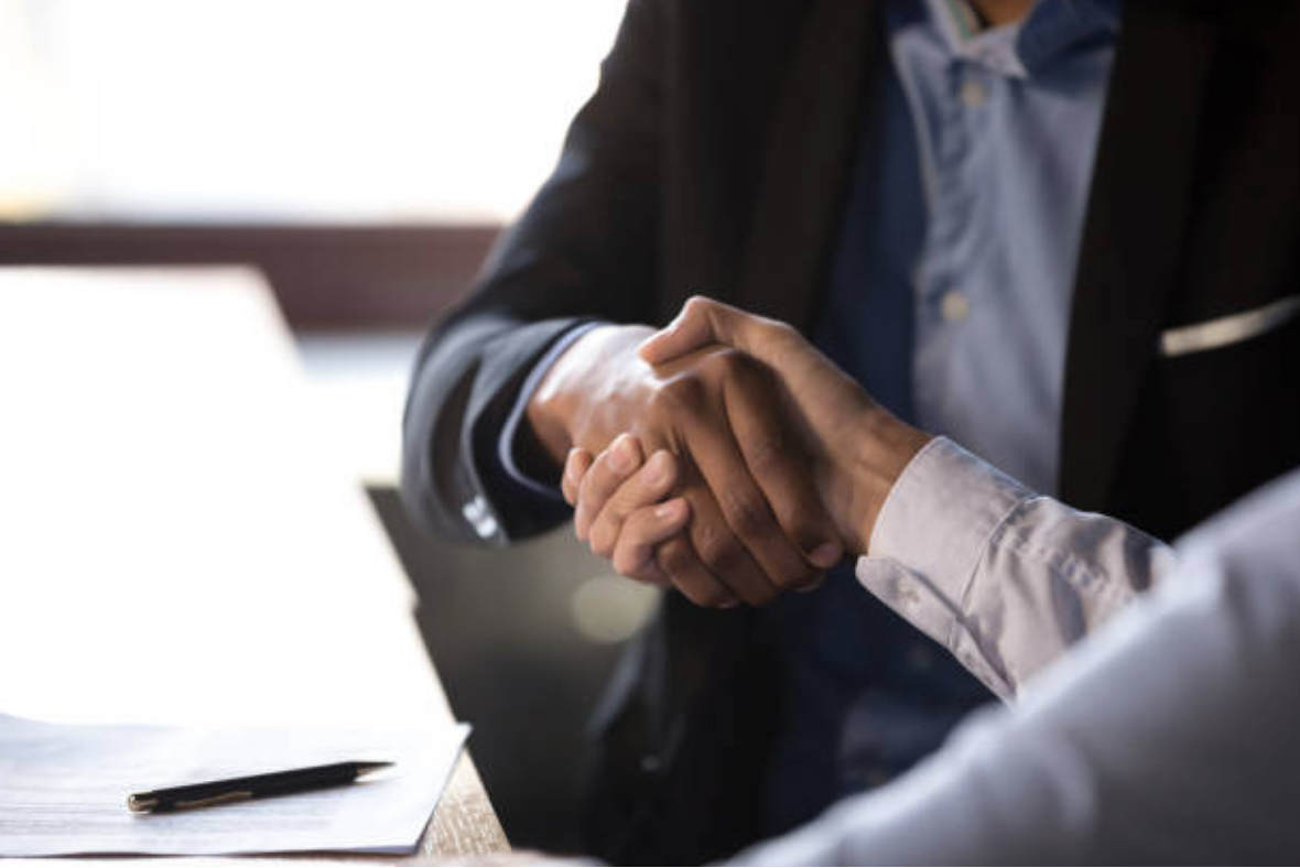 Two people shaking hands