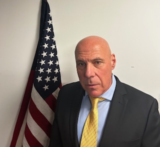 man standing looking at the camera