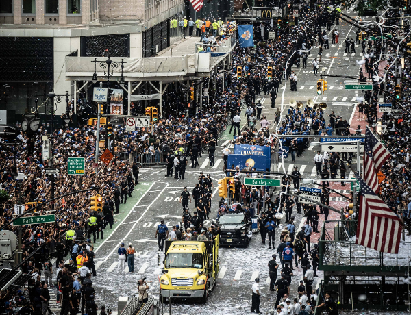 Parade goers celebrate the NY Knicks
                                           