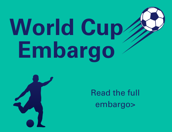 Image has a green background and a blue and white soccer ball and a blue soccer player. 
                                           