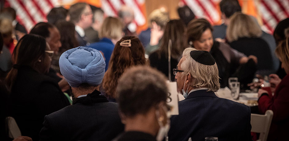 people of faith are dining in the a ballroom
                                           