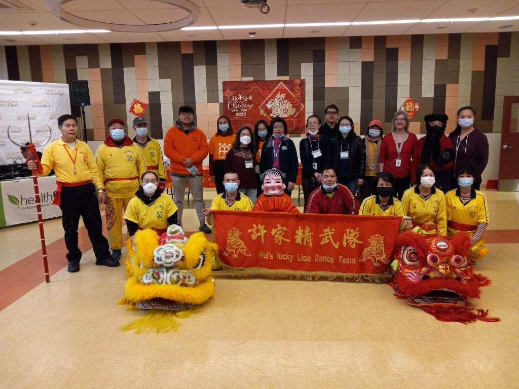 Group of individuals celebrating Chinese New Year.