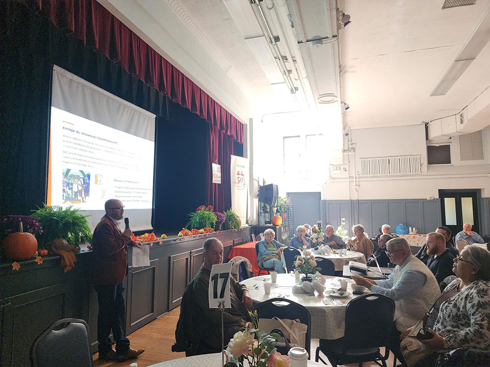 Photo of Polish and Russian speaking New Yorkers in a community space learning about civic engagement and voting rights
