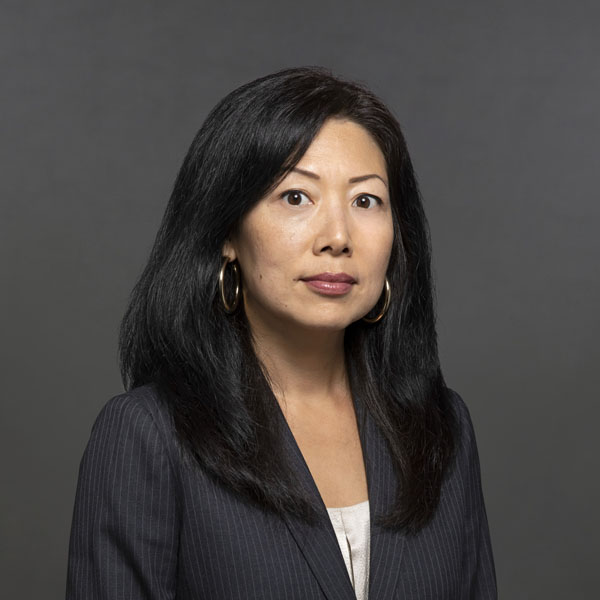 headshot photo of Chisun Lee wearing a black blazer.