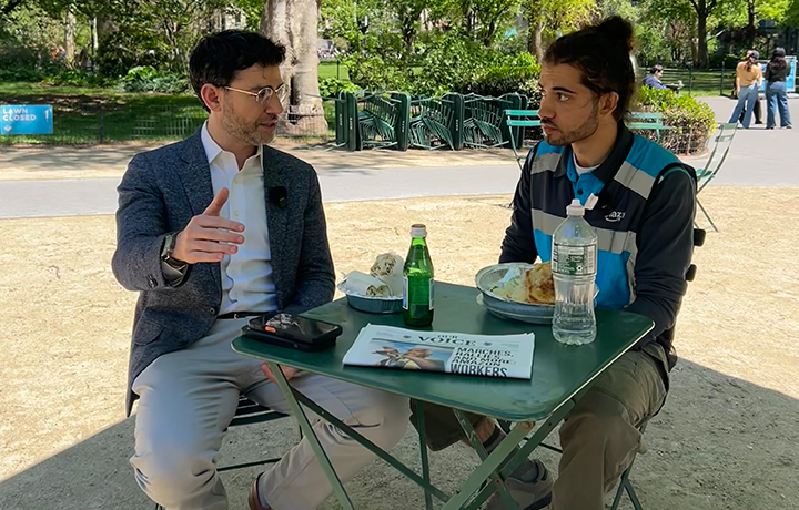 Commissioner Sam Levine speaks with a member of Amazon Teamsters
                                           