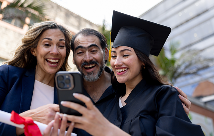 Parents celebrate their child's graduation
                                           