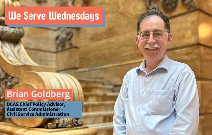 Brian Goldberg poses in a blue shirt inside the Surrogate's Court building.
                                           