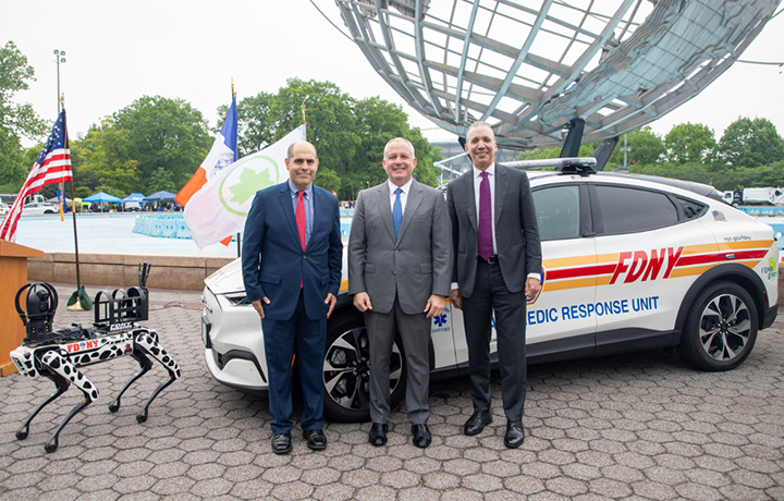 DCAS Deputy Commissioner Keith Kerman, FDNY Commissioner Robert S. Tucker, and DCAS Commissioner Louis A. Molina in Flushing Meadow Park.
                                           