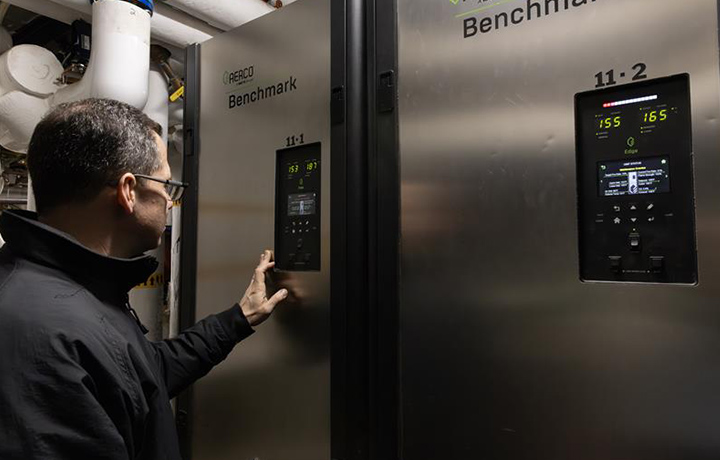 Bronx Zoo worker, makes adjustment to newly installed HVAC system.
                                           