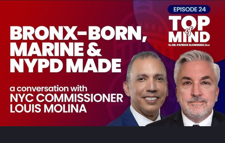 Top of Mind Commissioner Louis Molina in a pic behind Patrick T. Slowinski Bronx-Born, Marine and NYPD made.
                                           