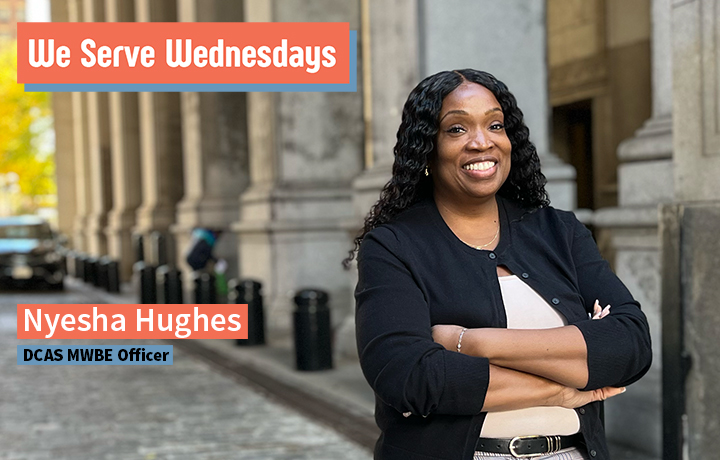 Nyesha Hughes posing outside, arms crossed in front of 1 Centre Street.
                                           