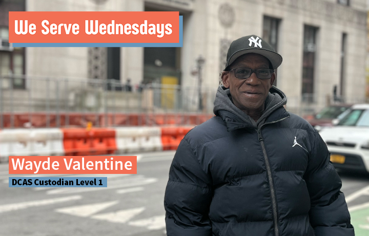 Wayde poses outside of 80 Centre Street wearing a black down coat.
                                           