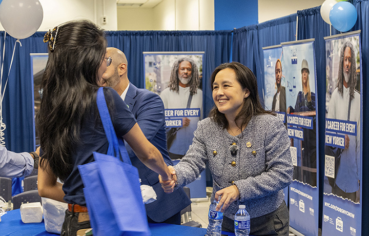 DCAS Commissioner Yume Kitasei greets attendees at the new Jobs NYC Center at 2 Lafayette Street.
                                           