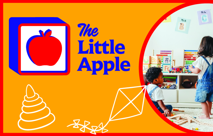 An apple on a children's block, The Little Apple, picture with two children playing in school setting.
                                           