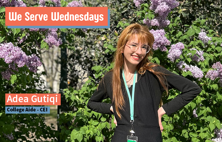 Young woman wearing a black shirt with long reddish hair stands in front of lavender hydrangeas.


                                           