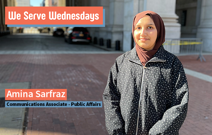 Young woman smiling standing outside of One Centre St.
                                           