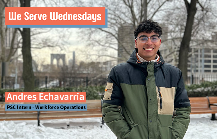 Young man wearing glasses and a winter coat, outside in the winter with snow on the ground.
                                           