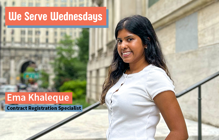 Portrait of Ema Khaleque, a contract registration specialist at DCAS, standing outside the David N. Dinkins Municipal Building. The landmark Municipal Building archway is visible in the background.
                                           