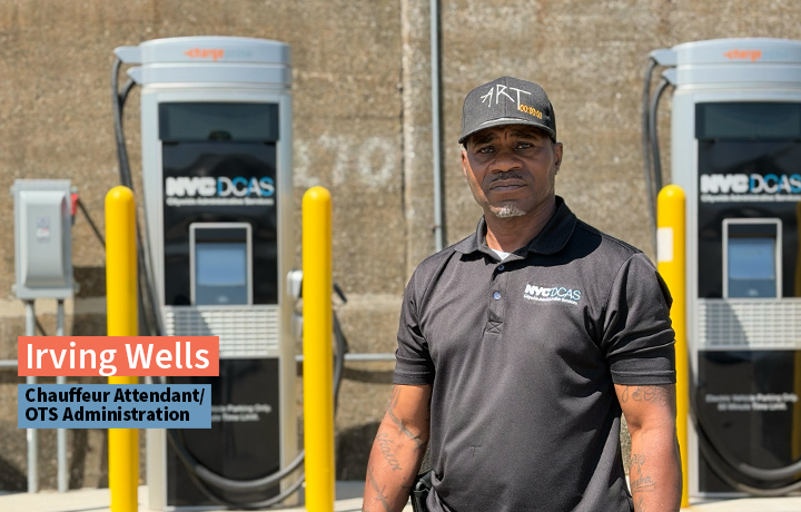 Man wearing a DCAS polo shirt standing in front of DCAS charging stations.


                                           