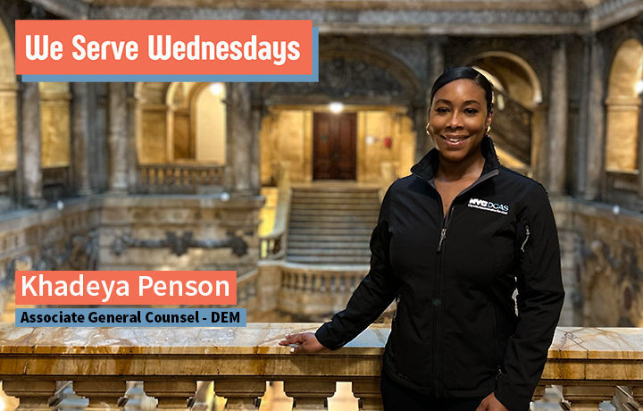 Smiling woman inside 31 Chambers St. wearing a D C A S jacket.
                                           