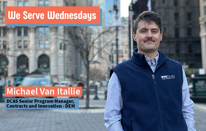 A man with a moustache stands a block away from the Muni Building wearing a DCAS fleece vest.
                                           