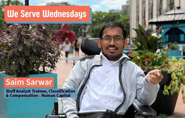 Young man in a wheelchair outside of One Centre St. in the back of the building.
                                           