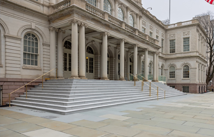 The historic steps at City Hall, restored with new granite risers and treads and new lift, ramp and handrails.