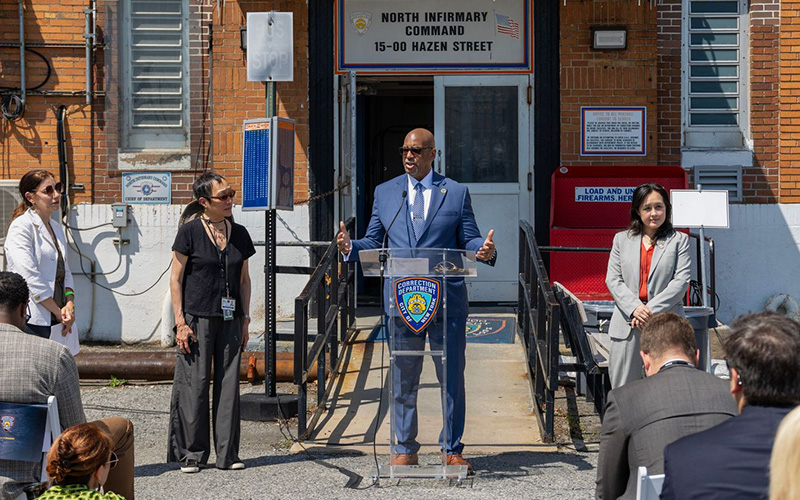 Press conference in front of the North Infirmary Command announcing the facility transfer.